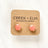clay hexagon studs coral closeup