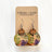 cora cork and wood painted canopy earrings close up