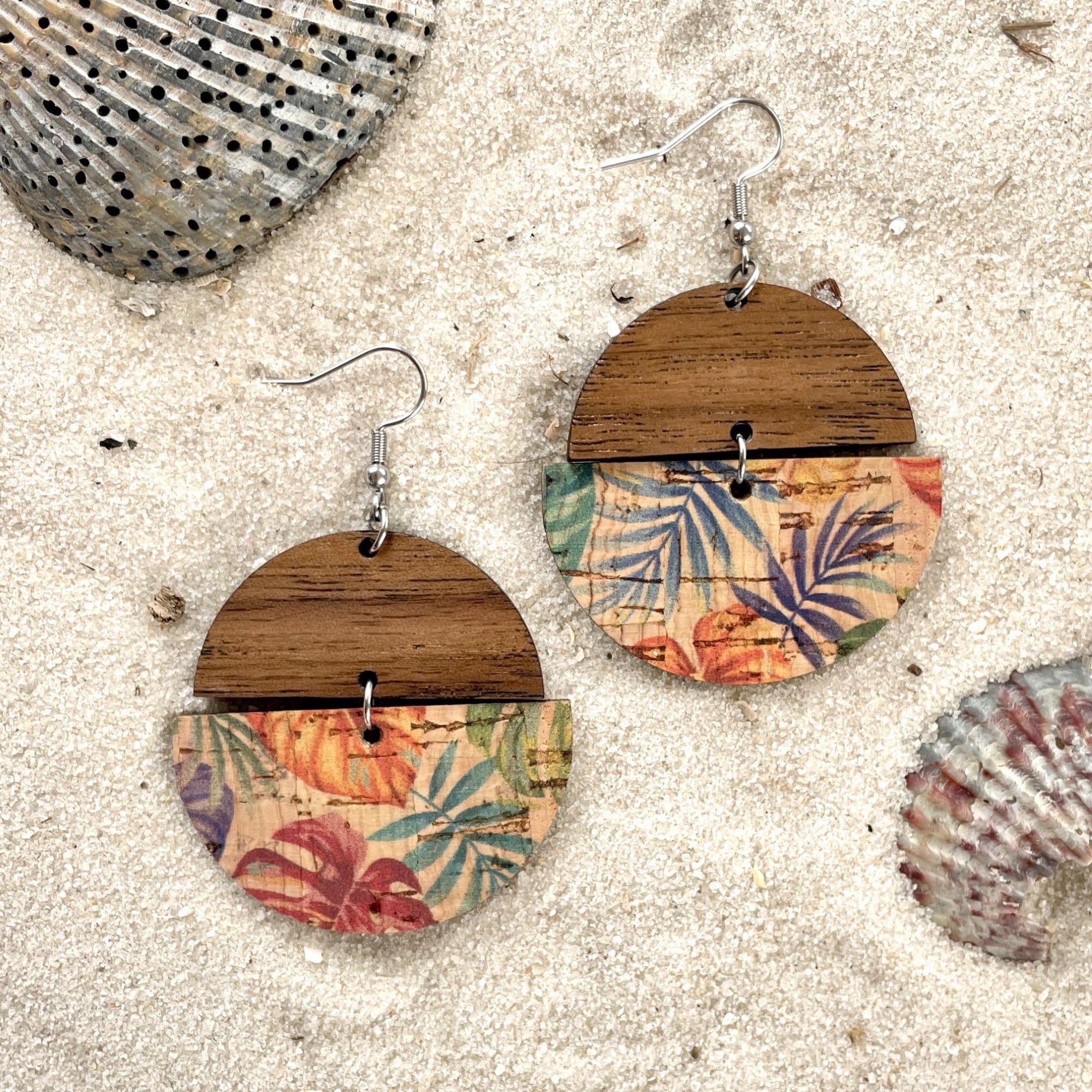 everly painted canopy cork and wood earrings on sand with shell background