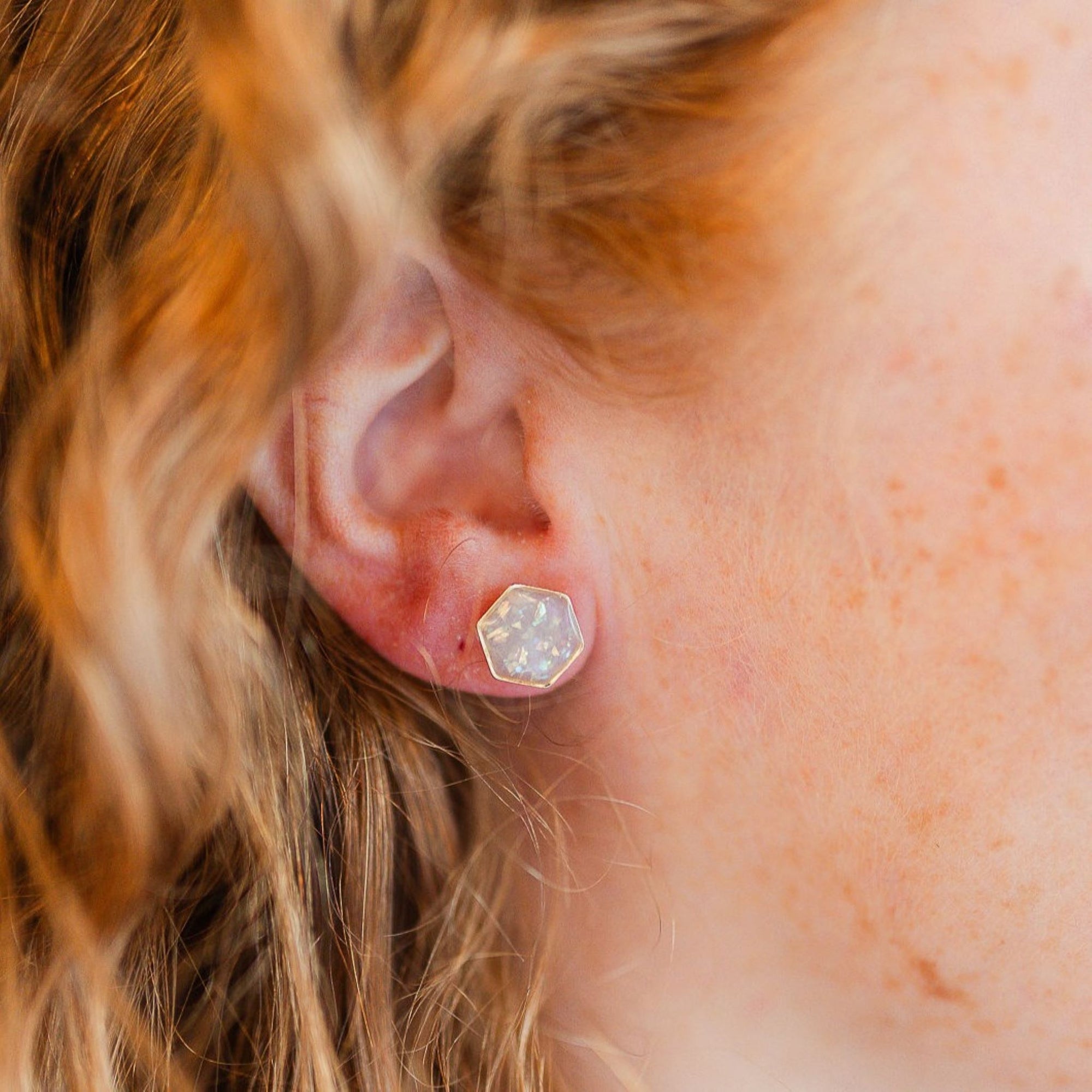Opal Clay Hexagon Studs on ear close up
