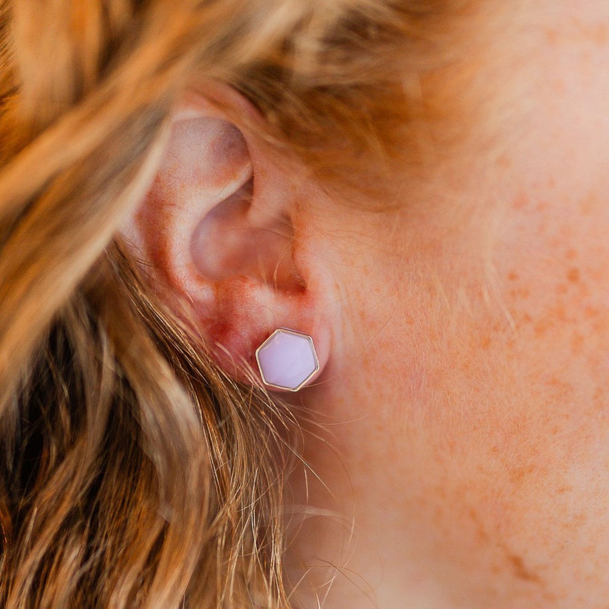 clay hexagon studs lavender on ear close up