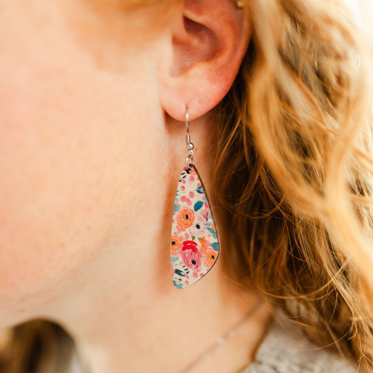 Close up shot of the Eliza Summer Garden cork teardrop earrings 