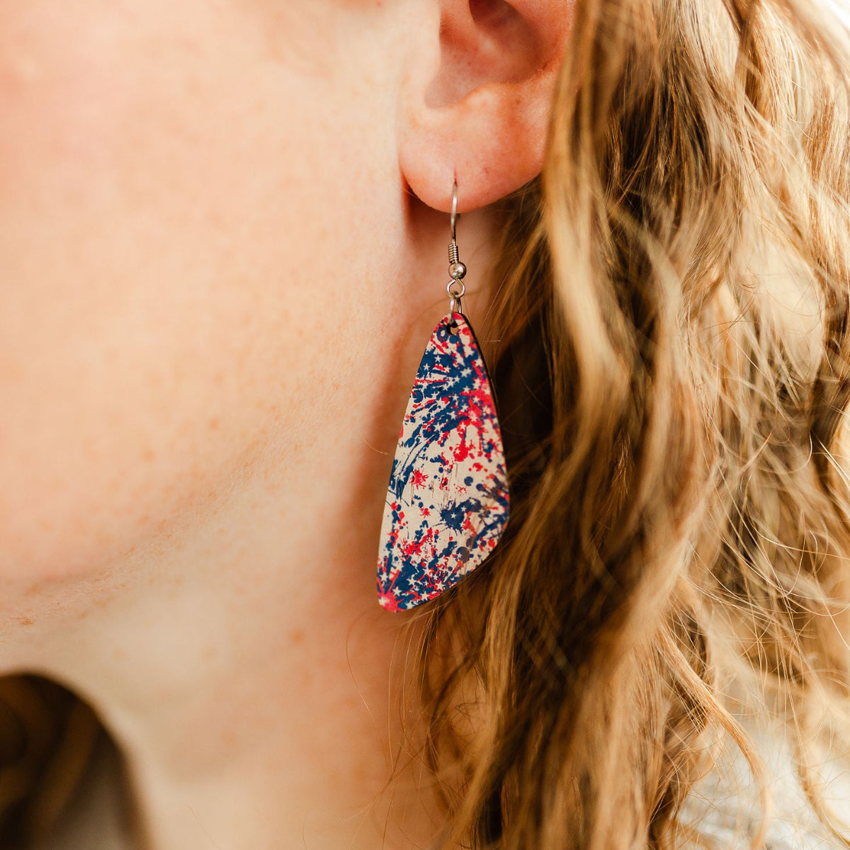 Close up look of the Eliza Star Spangled cork teardrop earrings