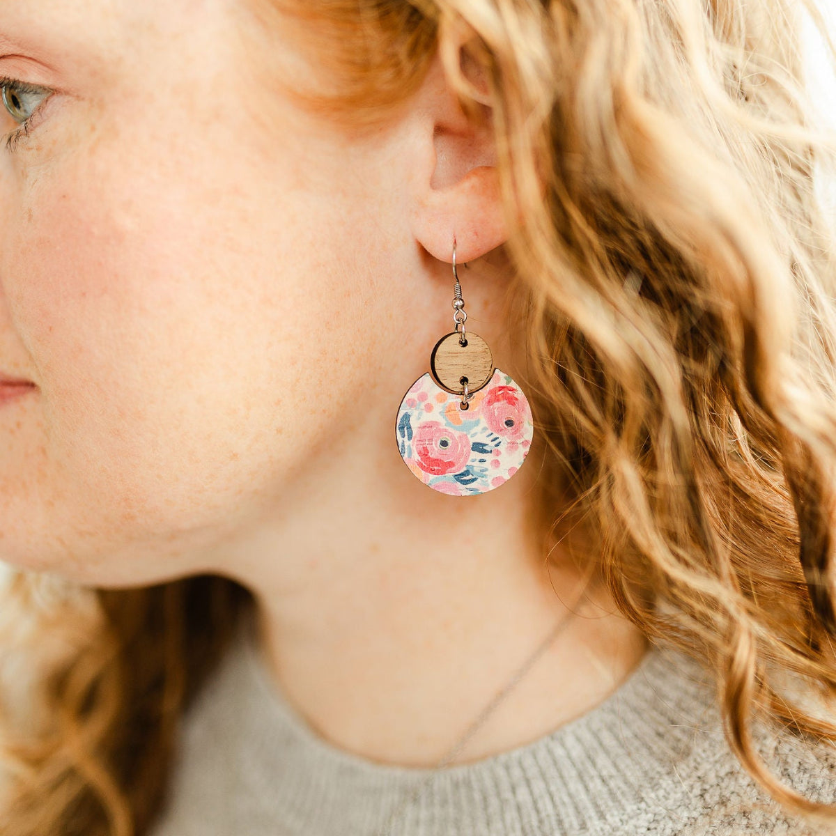 Close up shot of the Cora Summer Garden cork and walnut earrings 