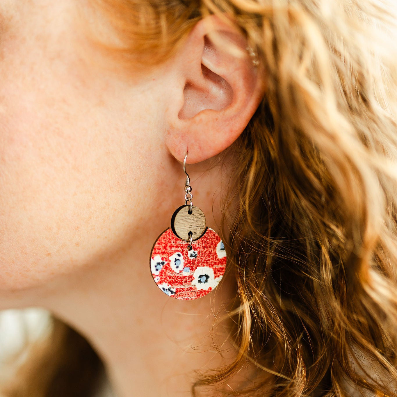 Close up of the Fireworks pattern cork and walnut earrings 