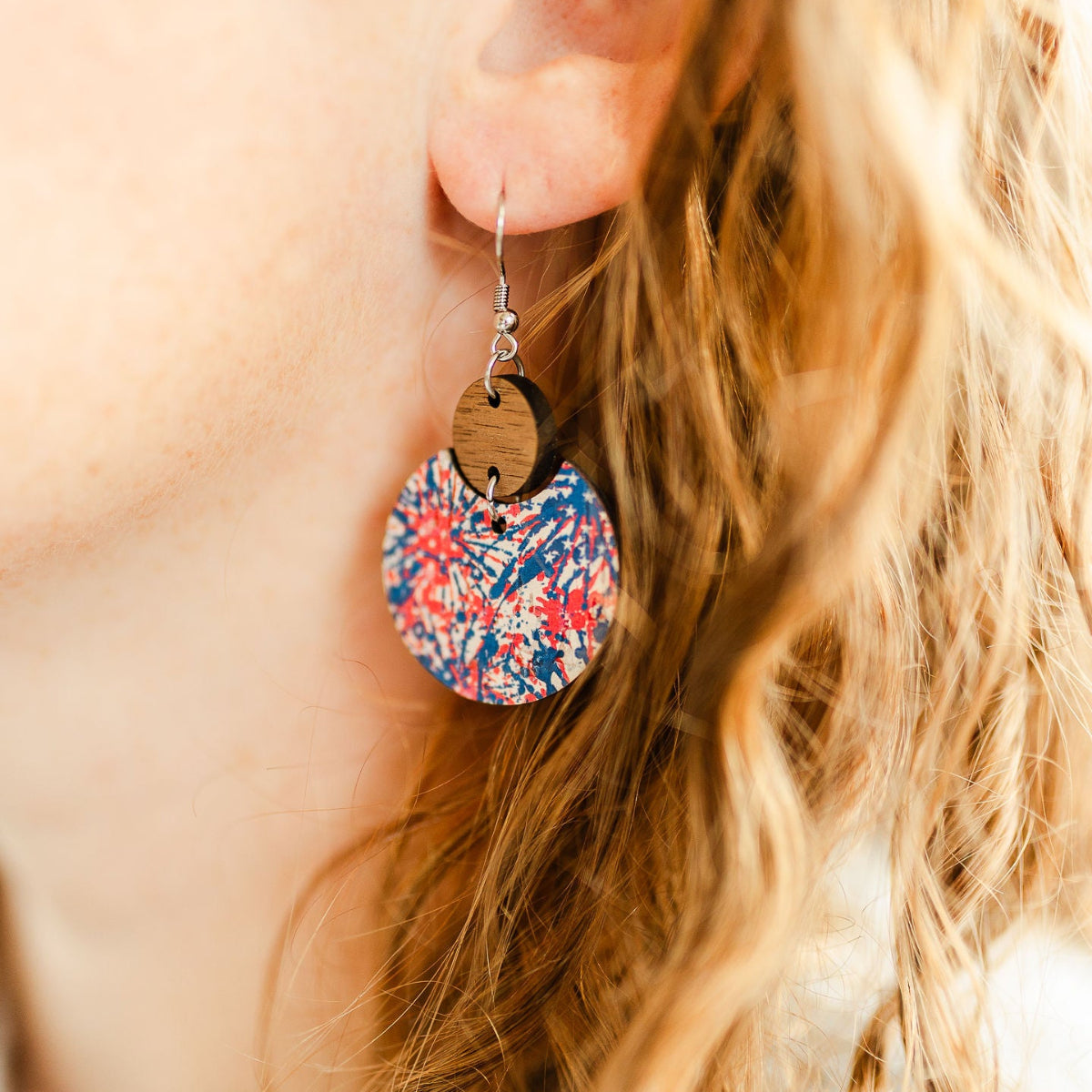 Close up look for the Cora Star Spangled cork and walnut earrings patriotic star design lightweight