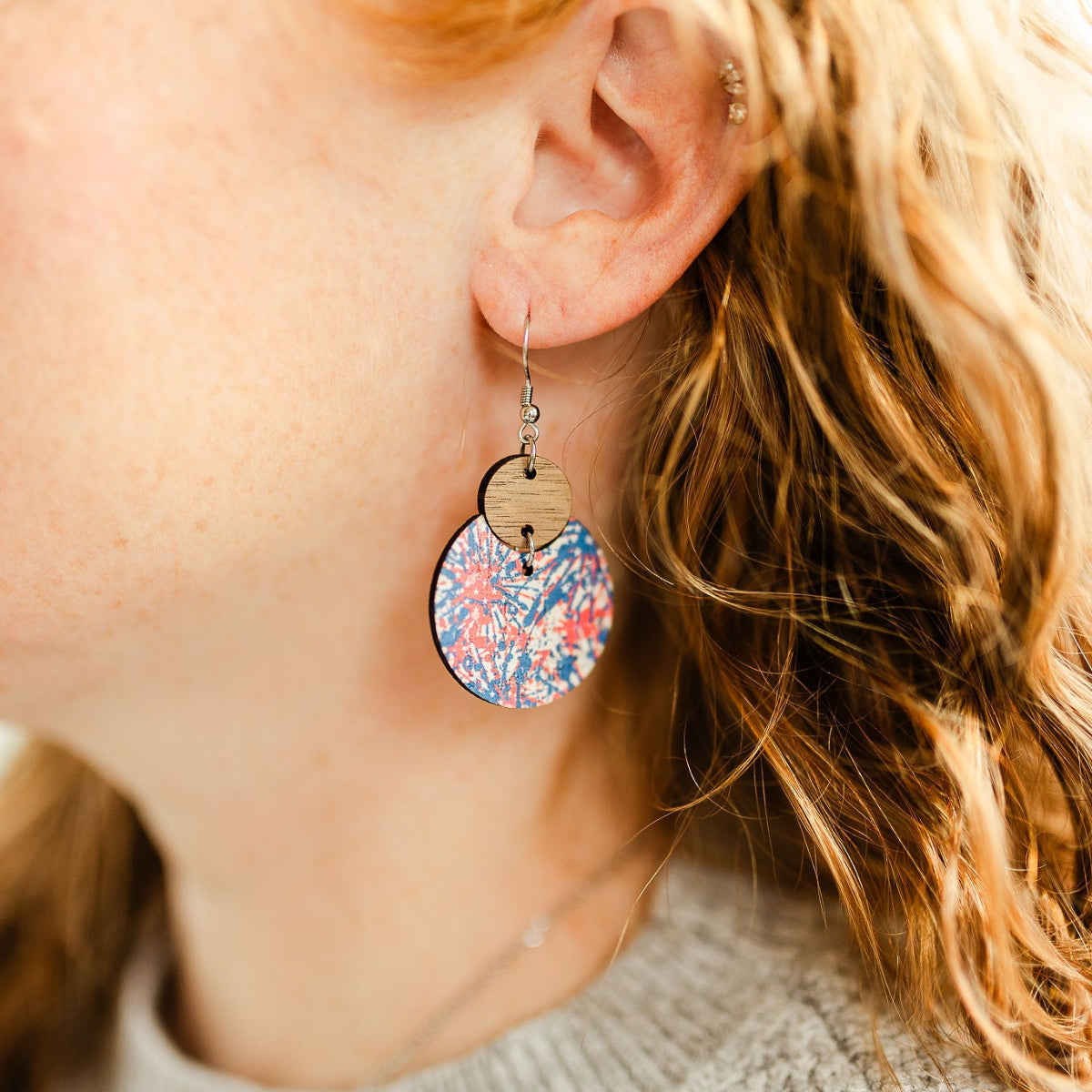 Close up shot for the Cora Star Spangled cork and walnut earrings 