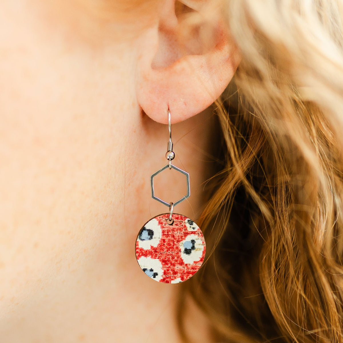 close up look of the Silver Elizabeth fireworks cork hexagon earrings 