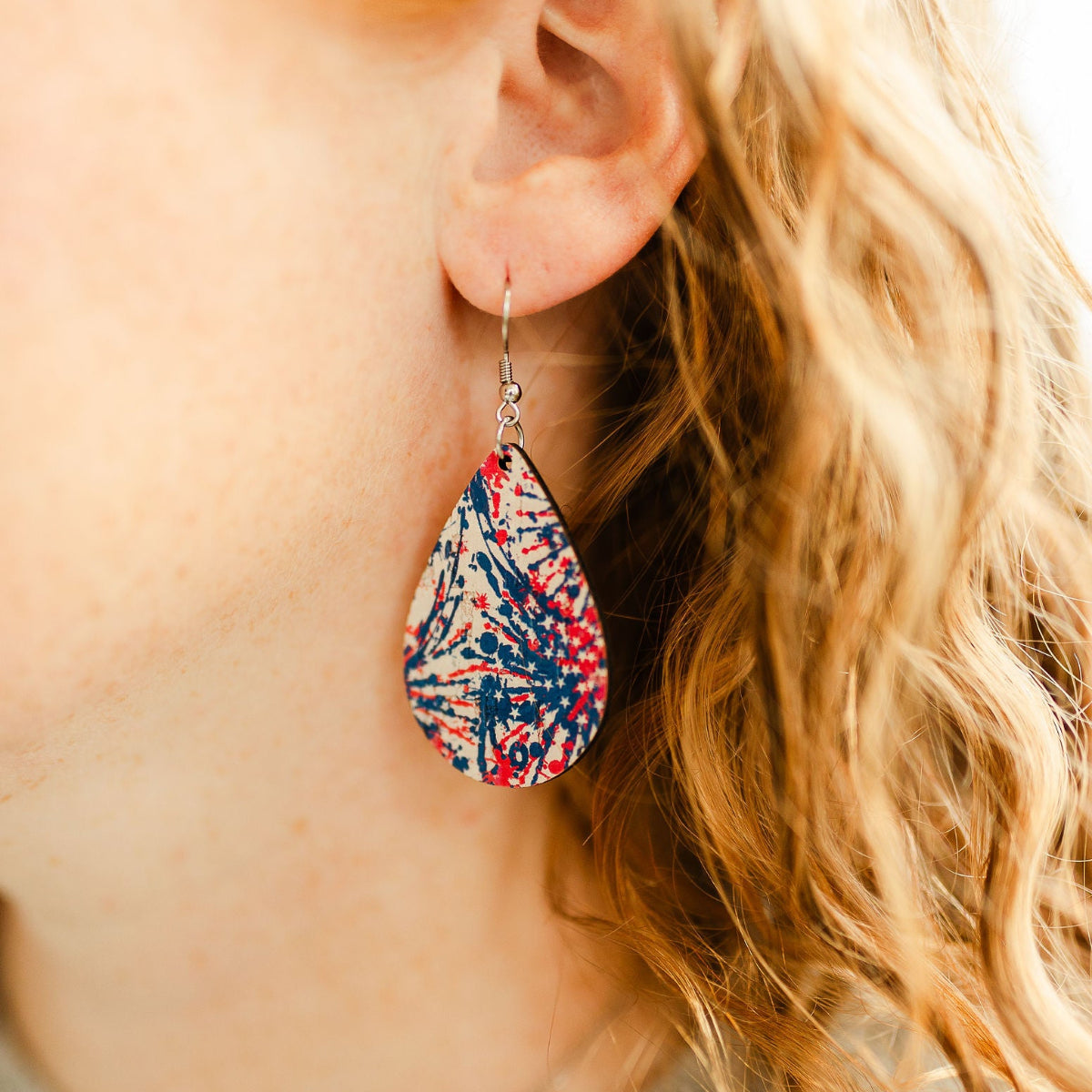 Close of the Kendra star spangled cork teardrop earrings lightweight festive patriotic jewelry