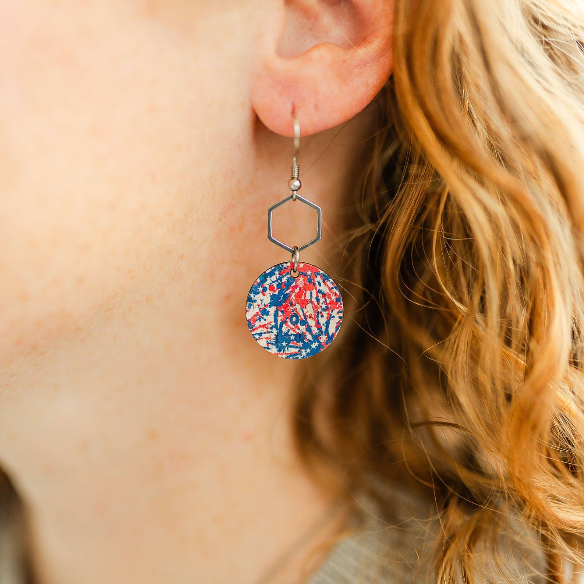 Close up look of the Silver Elizabeth star spangled cork and hexagon earrings