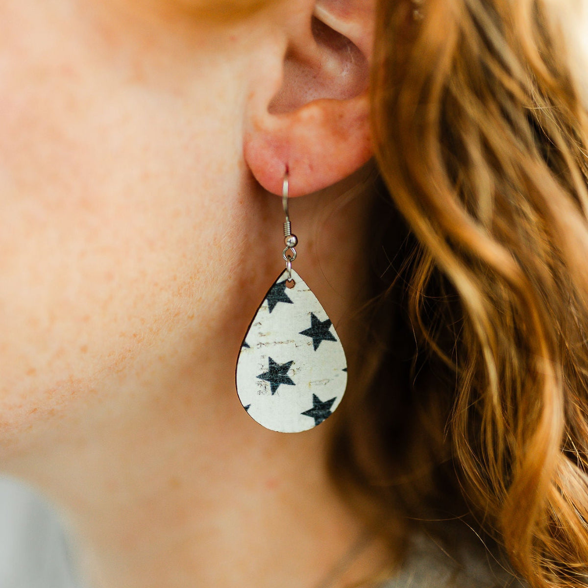 Close up look of the Blue stars cork teardrop earrings lightweight