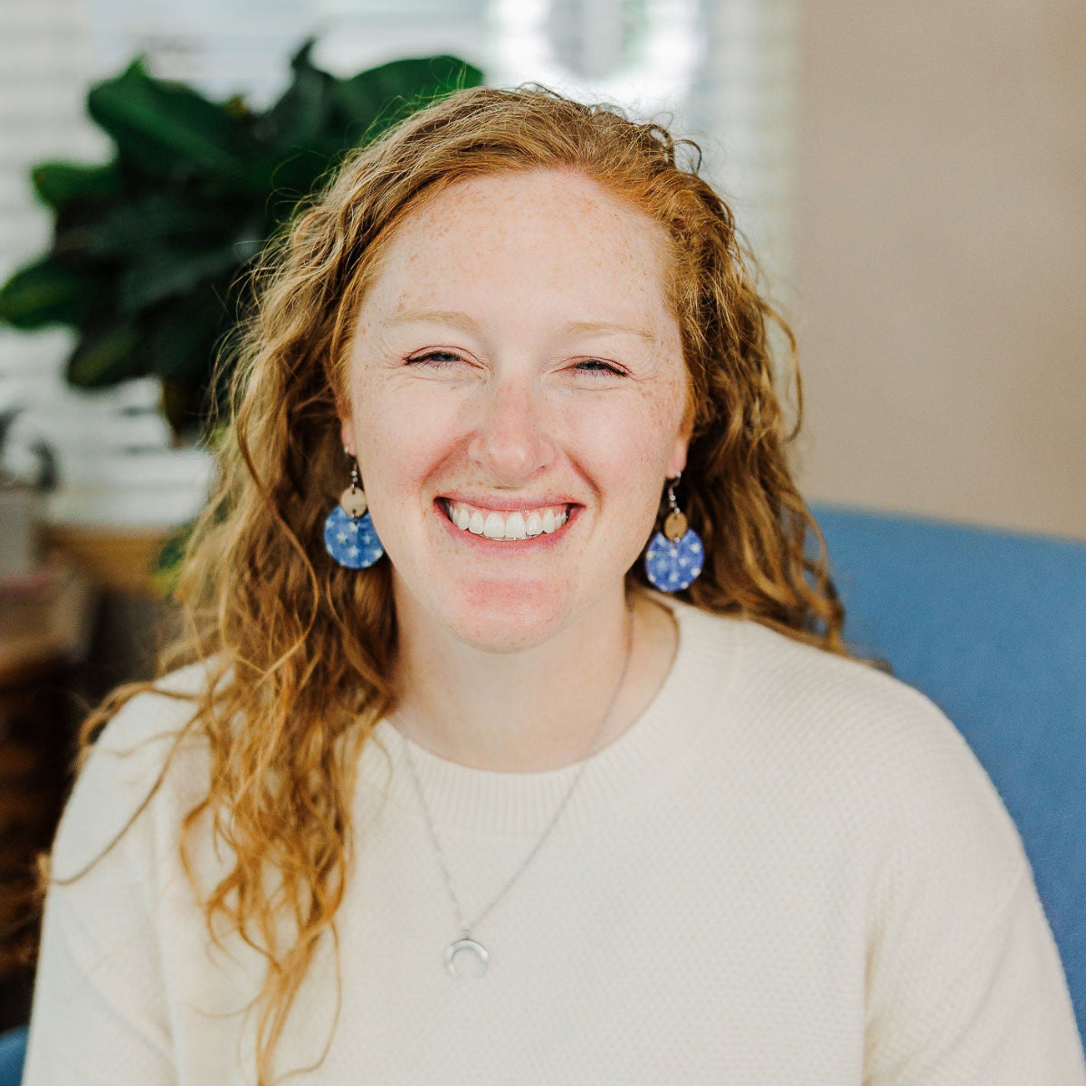 Woman wearing a creek+elm earring