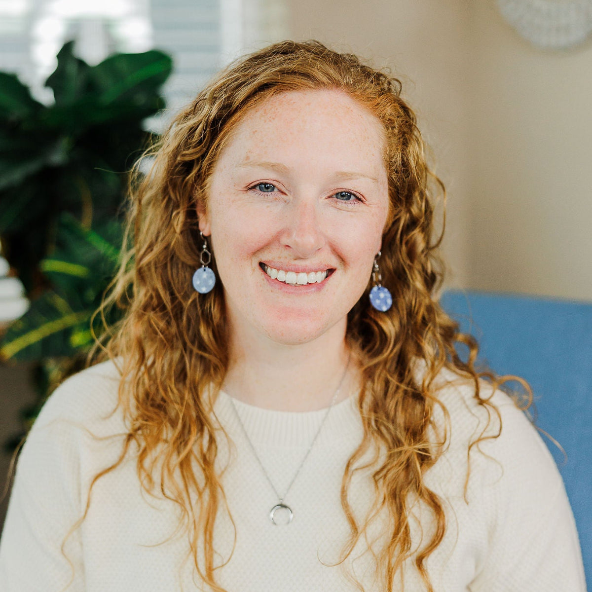 Woman wearing a creek+elm earring