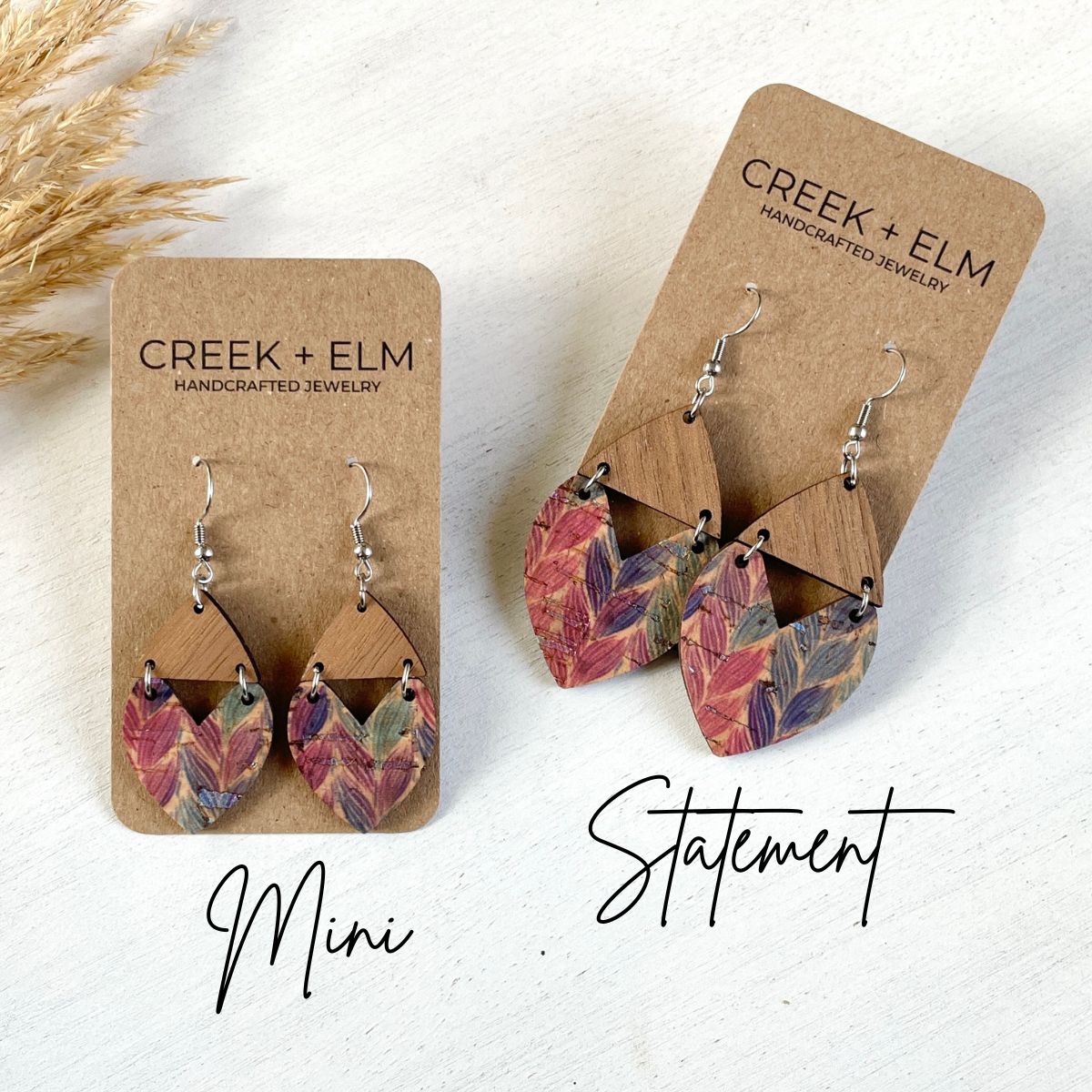 Mini and statement sizes of the Scarlett braided pastel cork and walnut heart earrings on packaging 