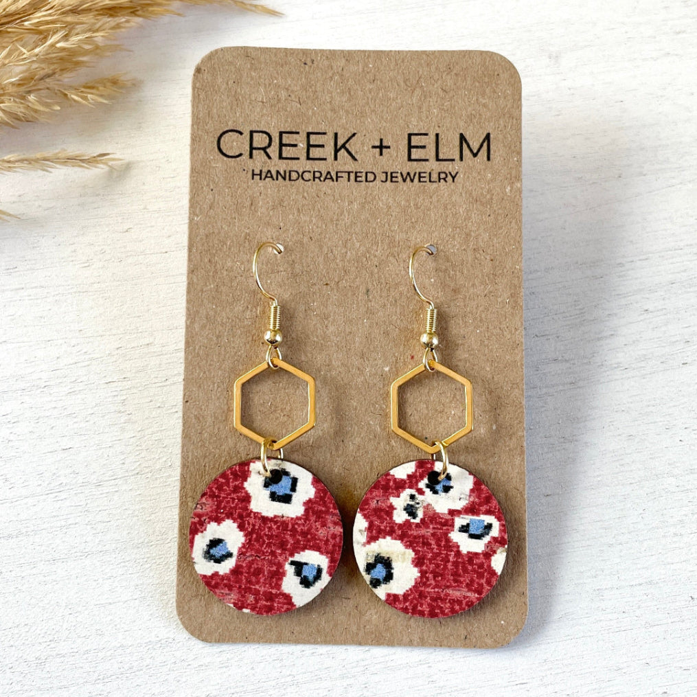 Gold Elizabeth fireworks cork hexagon earrings on Creek+Elm Packaging