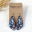 Eliza Patriotic Poppies cork teardrop earrings on plain background