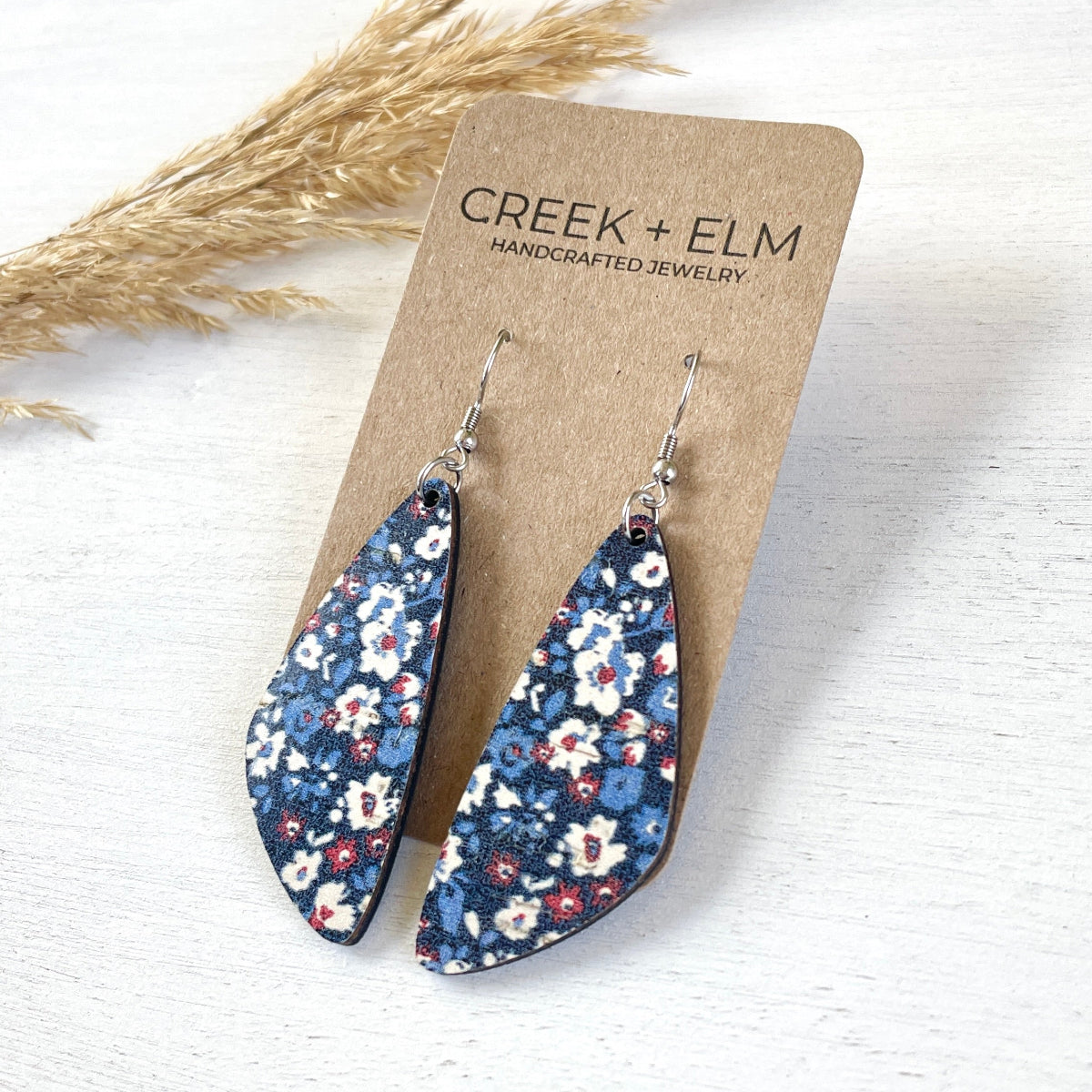 Eliza Patriotic Poppies cork teardrop earrings on packaging