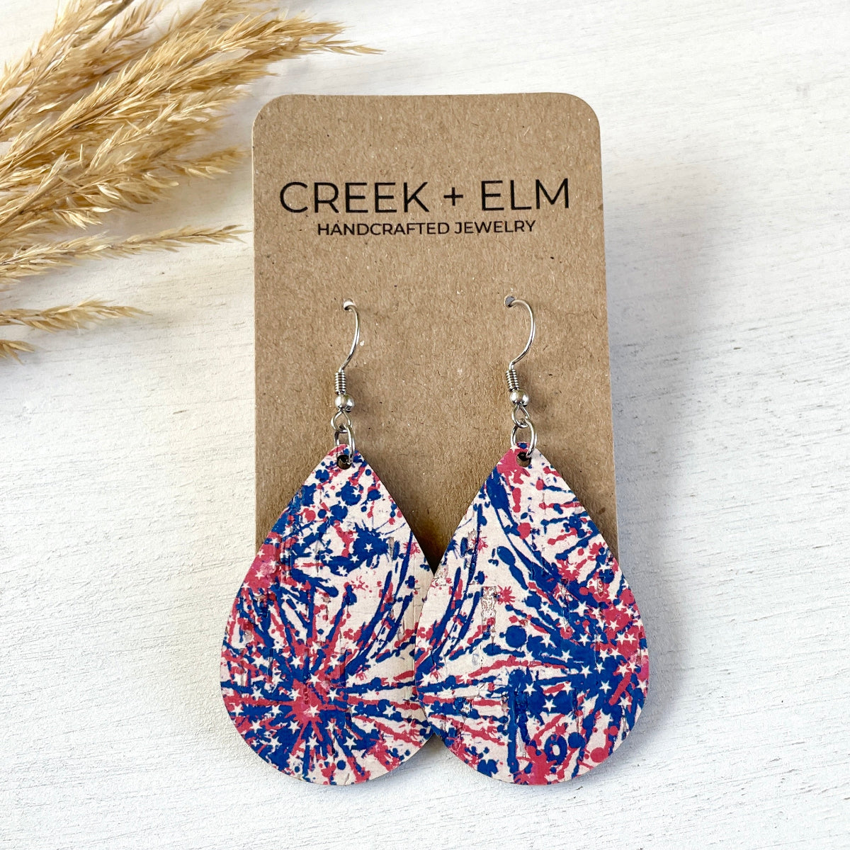 Statement Size Kendra star spangled cork teardrop earrings on packaging