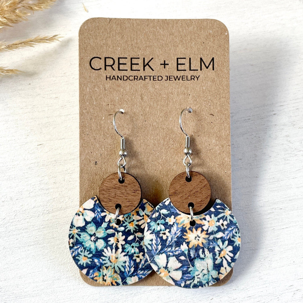Close up on Packaging of the Cora Blue Floral cork and walnut earrings 