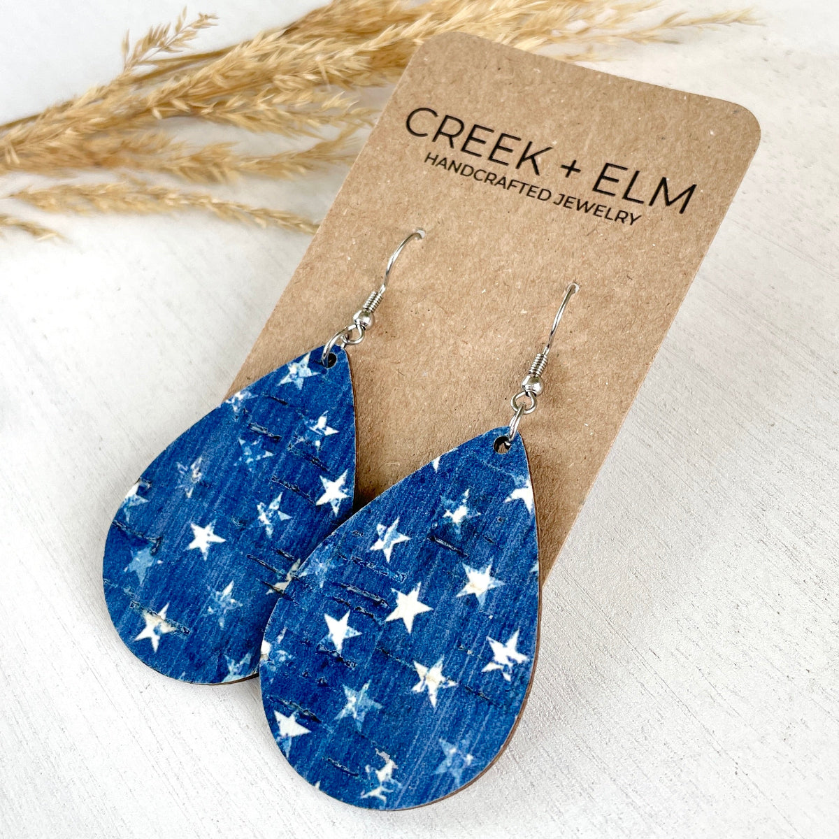 Kendra Denim Stars cork teardrop earrings in Silver 