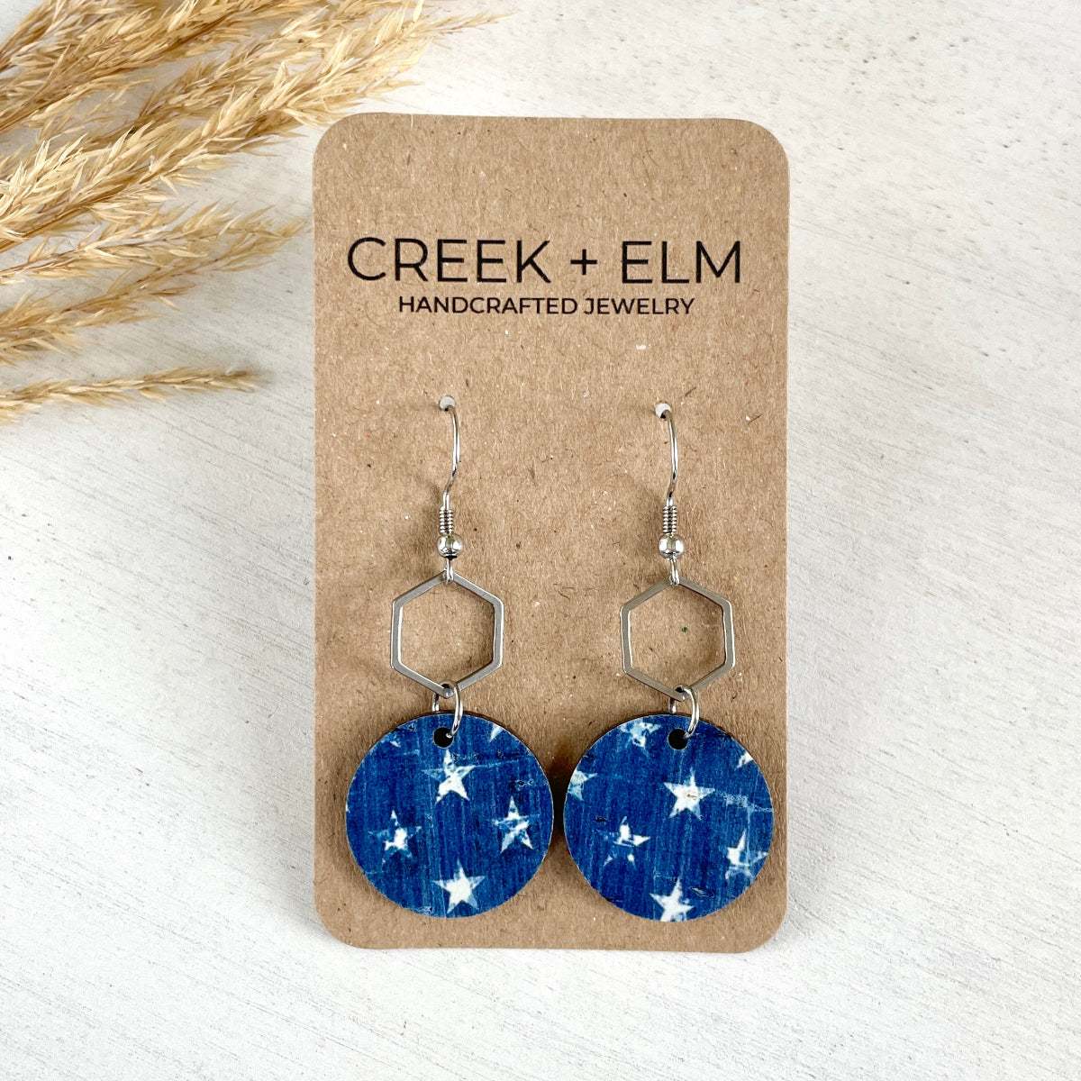 Silver Elizabeth Denim Stars cork and hexagon earrings on Creek+Elm Packaging