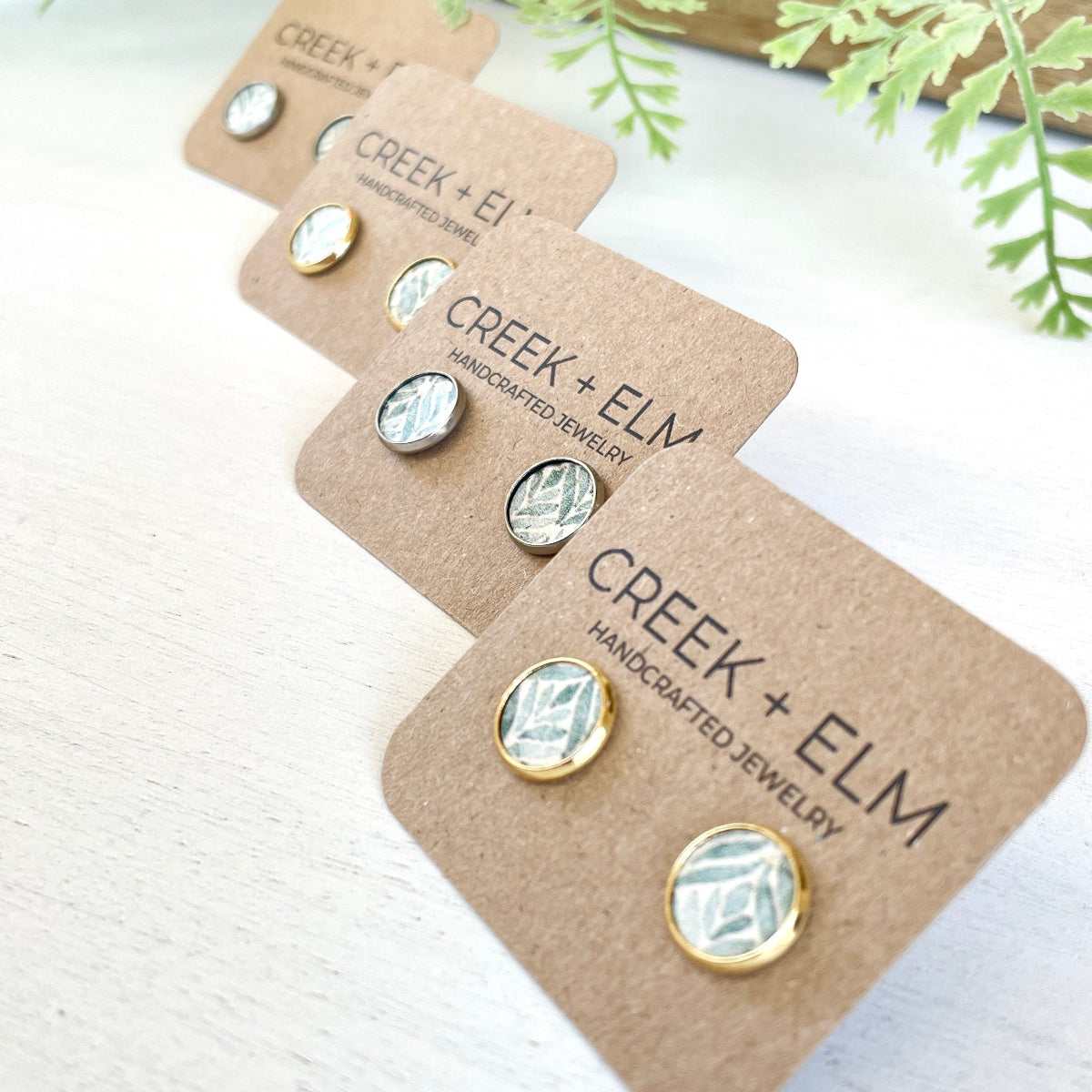 Silver and Gold creek+elm studs on packaging