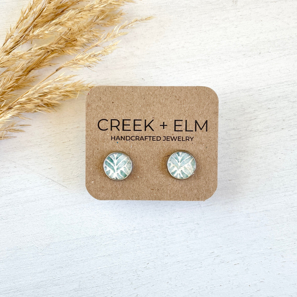 Teal leaves on the the creek+elm studs