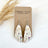 Creek+Elm earrings on carded packaging