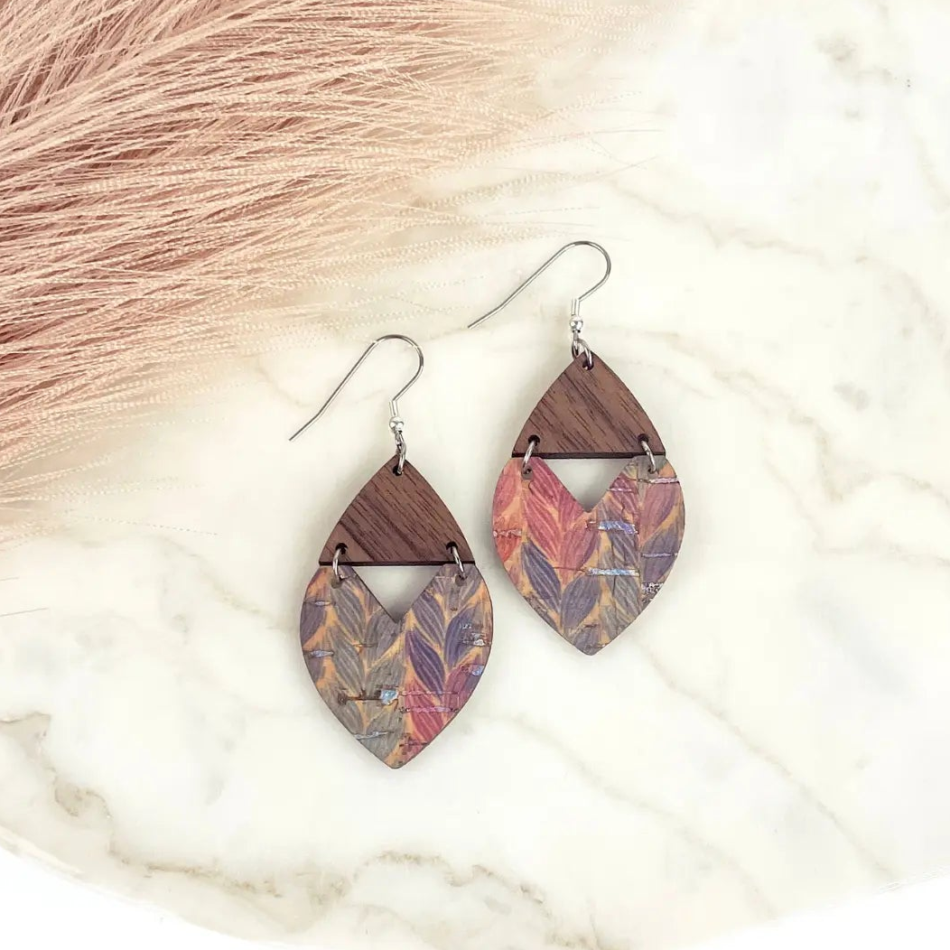 Pair of Scarlett braided pastel cork and walnut heart earrings on whitebackground